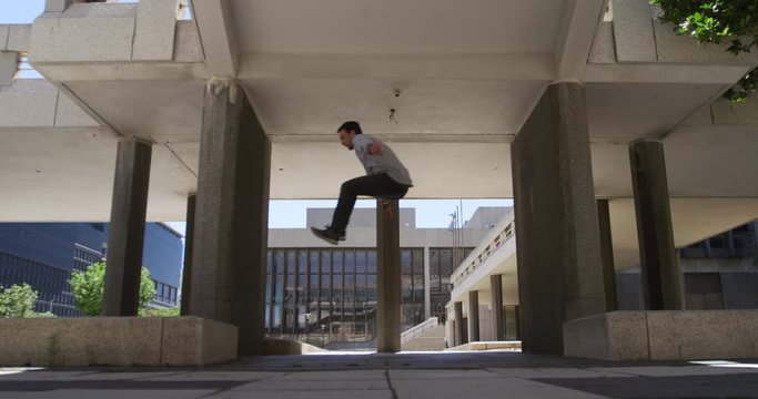 Caucasian man practicing parkour