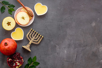 Rosh Hashana jewish new year concept. Apple and honey on the table, top view