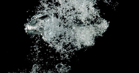 big bubbles splashing into the water.
