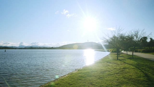 Wide pan shot of Lake Burley Griffin and Telstra Tower, Canberra