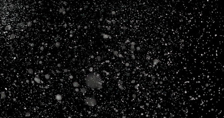 Falling Snowflakes showcases infinite snowflakes falling over a black background. Magical and mysterious.