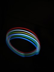 light painting Photography, long exposure, ripple curve and circle against black background