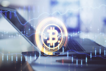 Double exposure of blockchain and crypto economy theme hologram and table with computer background....