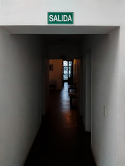 Exit, hall, and exterior door, spanish writting