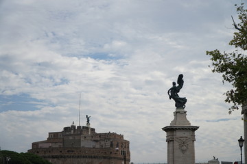 Angel on guard of Rome, statue of an angel on the background Castle Sant'Angelo, Rome, Italy