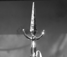 Shiny point of flagpole