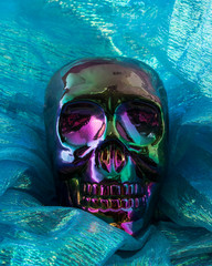 Isolated colourful iridescent rainbow skull on  background