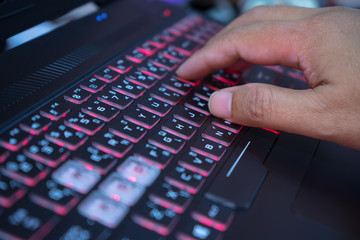 typing on a laptop keyboard