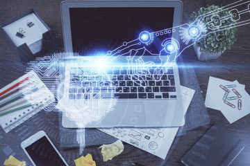 Multi exposure of work space with computer and human brain hologram. Brainstorm concept.