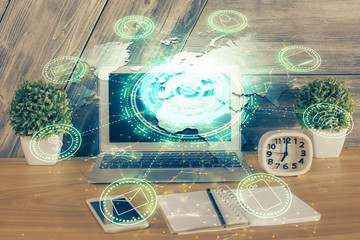 Computer on desktop with social network hologram. Multi exposure. Concept of international people...