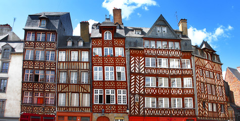 Rennes, France - Traditional half-timbered houses from the 17th century, Place du Champ-Jacquet. - obrazy, fototapety, plakaty