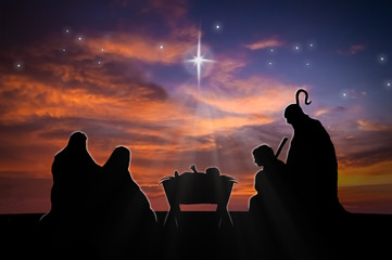 Christmas nativity scene of baby Jesus in the manger with Joseph, Mary and shepherds