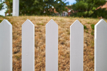 Closeup of a white fence