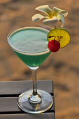 The juices are mixed into the cocktail and may be mixed with alcohol to add a pleasant flavor. Decorated with flowers, orchids and cherries