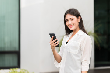 Fototapeta premium Young asian beautiful women using smartphone .
