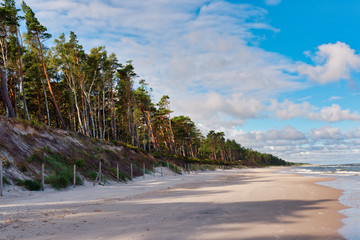 Scenic view of Baltic Sea white sand beach. Beautiful sea landscape in Poland.