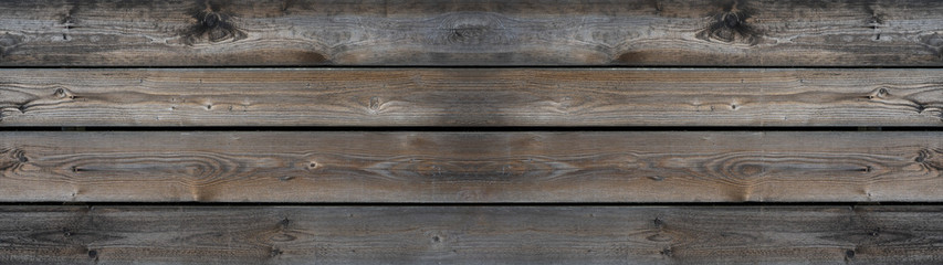 Old brown grunge rustic dark wooden texture - wood background panorama long banner	wide
