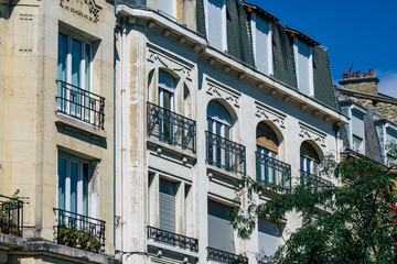 Naklejka premium View of the facade of a historical building located in Reims, a city in the Grand Est region of France and one of the oldest in Europe