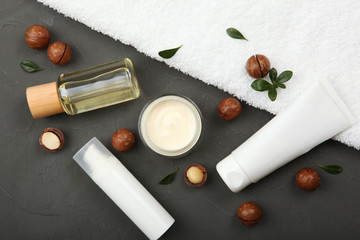 cosmetics with macadamia oil on the table
