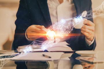 Human hands with tech theme double exposure drawings.