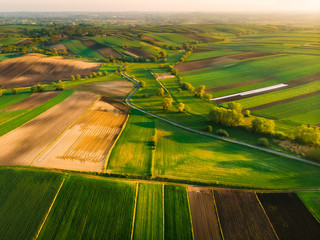 Nida Valley called Ponidzie in spring sunset time, drone aerial photos of fields.