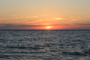 colorful sea sunset and orange sun