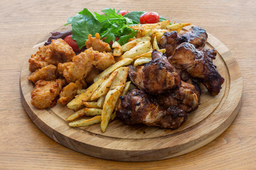 Honey Soy Chicken Wing Nibbles, Fried Chicken with Salad and Potato Chips