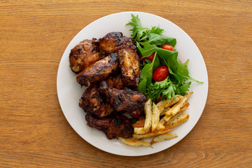 Honey Soy Chicken Wing Nibbles with Salad and Potato Chips