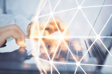 Social network theme hologram with businessman working on computer on background. Concept of world wide web. Double exposure.