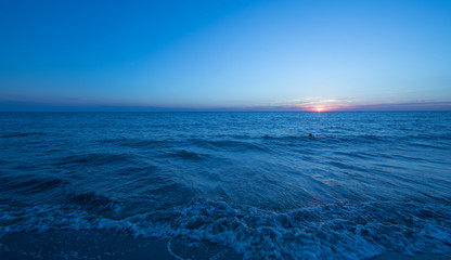 Fototapeta premium colorful sea sunset and orange sun