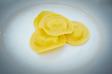 Italian traditional tortellini pasta over white plate. Healthy diet. Mediterranean cuisine.