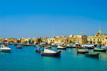 Malta : Some Maltese Traditional Small Fishing Boats In Marsaxlokk Sea, Malta