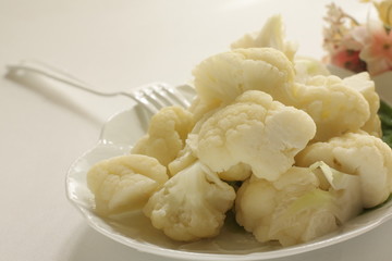 boiled cauliflower on white dish  for diet food 