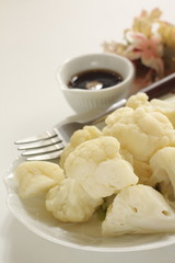 boiled cauliflower on white dish  for diet food 