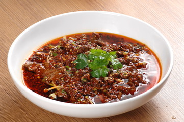  Close up of a popular Chinese Sichuan province cuisine Boiled sliced beef in hot spicy Chili oil   (Chinese: Shuizhuniurou)