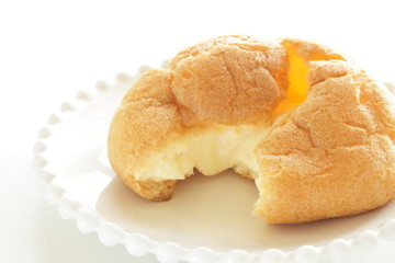 Japanese style confectionery, puff cream on dish for gourmet dessert