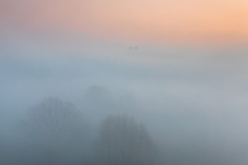 Tyniec abbey in morning fog in sunrise time. Cracow, Malopolska, Poland 