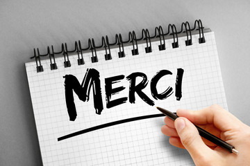 Merci (Thank You In French) text, concept background