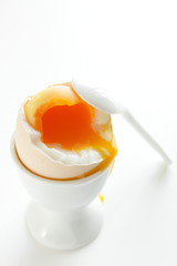 soft boiled egg in egg stand for breakfast 