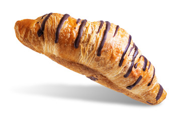 Croissant with chocolate glaze on a white isolated background