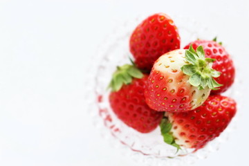 strawberry in glass bottle for spring dessert
