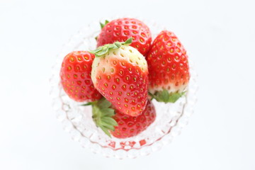 strawberry in glass bottle for spring dessert