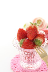 strawberry in glass bottle for spring dessert