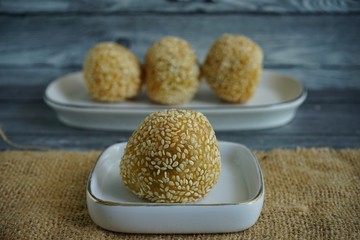 Onde onde Kumbu is Indonesian traditional food made from glutinous rice, filled with green bean extract, put the sesame seed out side and fried 