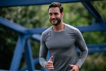 Athletic couple jogging in the city. Happy couple training outdoors