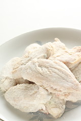 Homemade Korean food, prepared flour and marinated chicken wing for fried chicken cooking