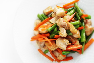 Chinese food, chicken and bean stir fried with carrot for comfort food