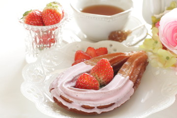 strawberry chocolate churros and fruit on dish for gourmet dessert