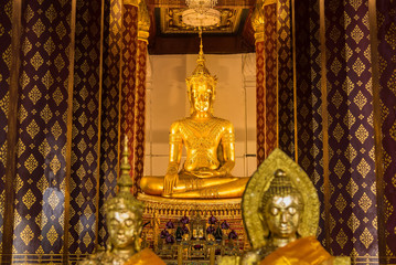 Ayutthaya, Thailand - June, 22, 2020 : Golden buddha image in ancient temple in Ayutthaya , Thailand