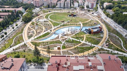 Aerial view of the open field playground and park at the city center. There is a walking path, cafeteria and pool. Eskisehir/Turkey